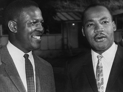 Martin Luther King Jr., right, and Professor Charles Willie during King's 1965 visit to the Syracuse University campus.