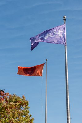 The Haudenosaunee flag flies alongside the SU Flag on the Quad.