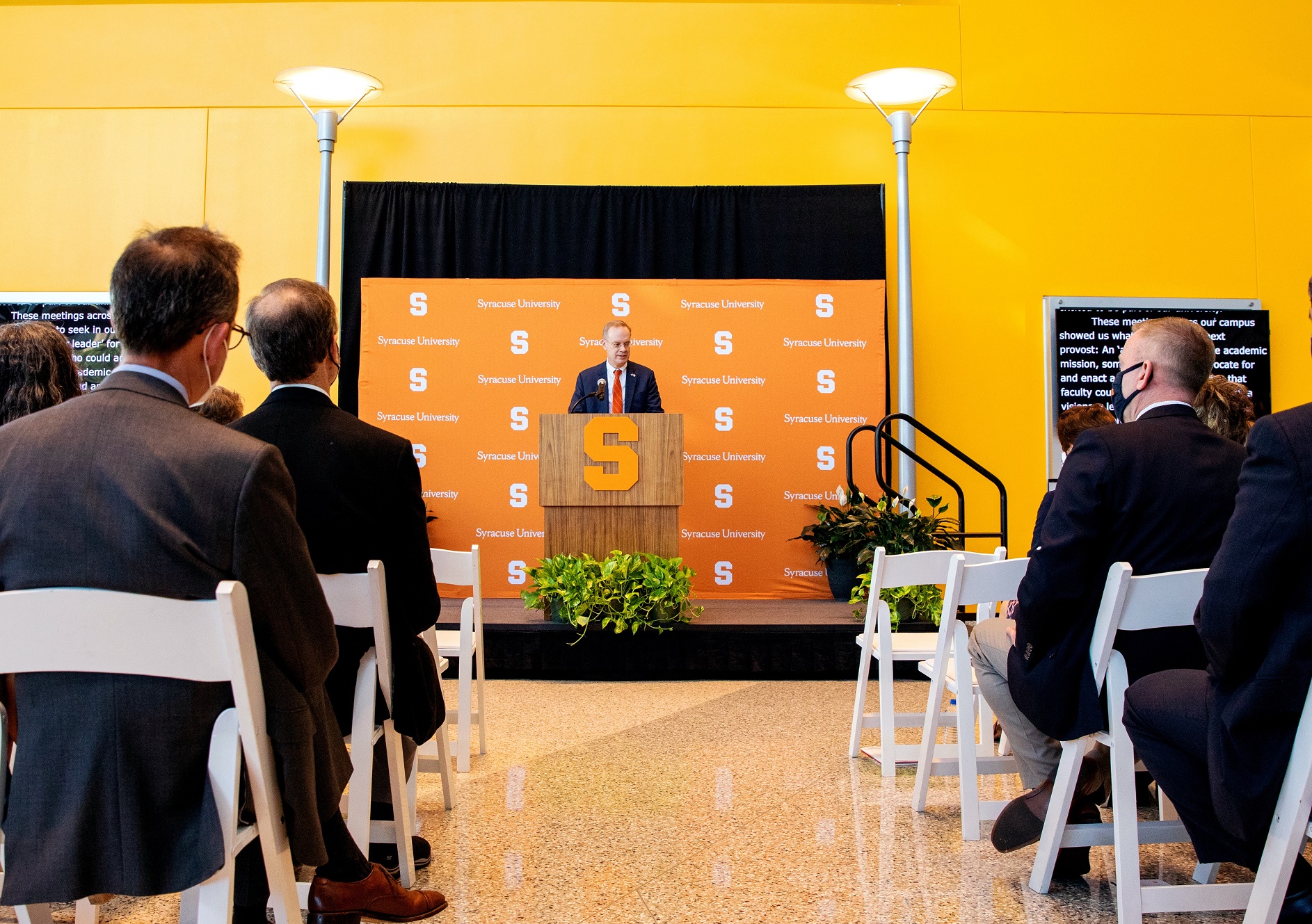 person at podium