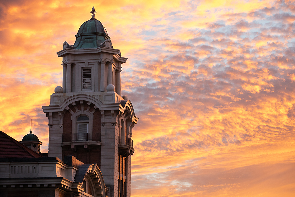 Syracuse University campus as the sun sets on a summer evening