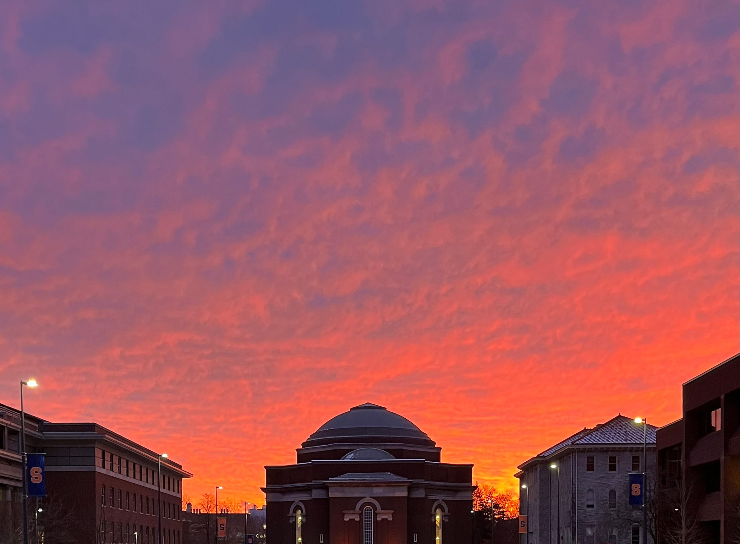 Orange and blue sky over Hendricks Chapel