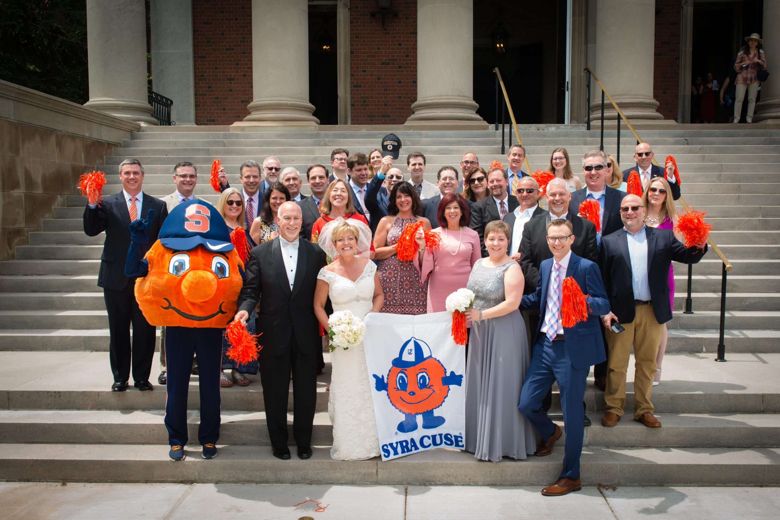 Large group of people on the steps of Hendricks Chapel after a wedding with Otto. 
