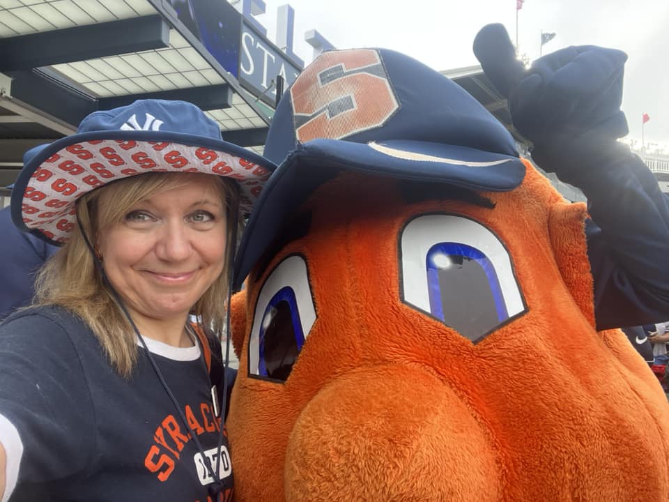 Woman standing next to Otto.