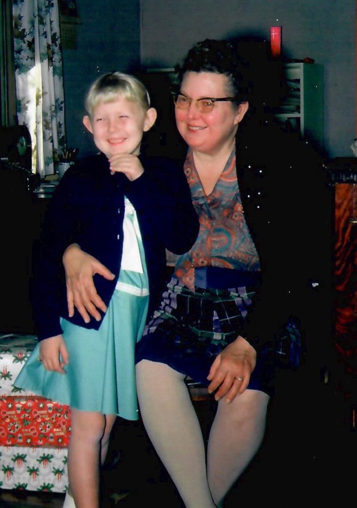 adult hugging a child