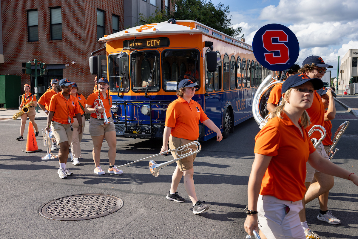 members of the marching band arrive downtown for Citrus in the City