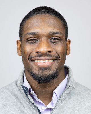 portrait of Jordan Shannon against a netural backdrop
