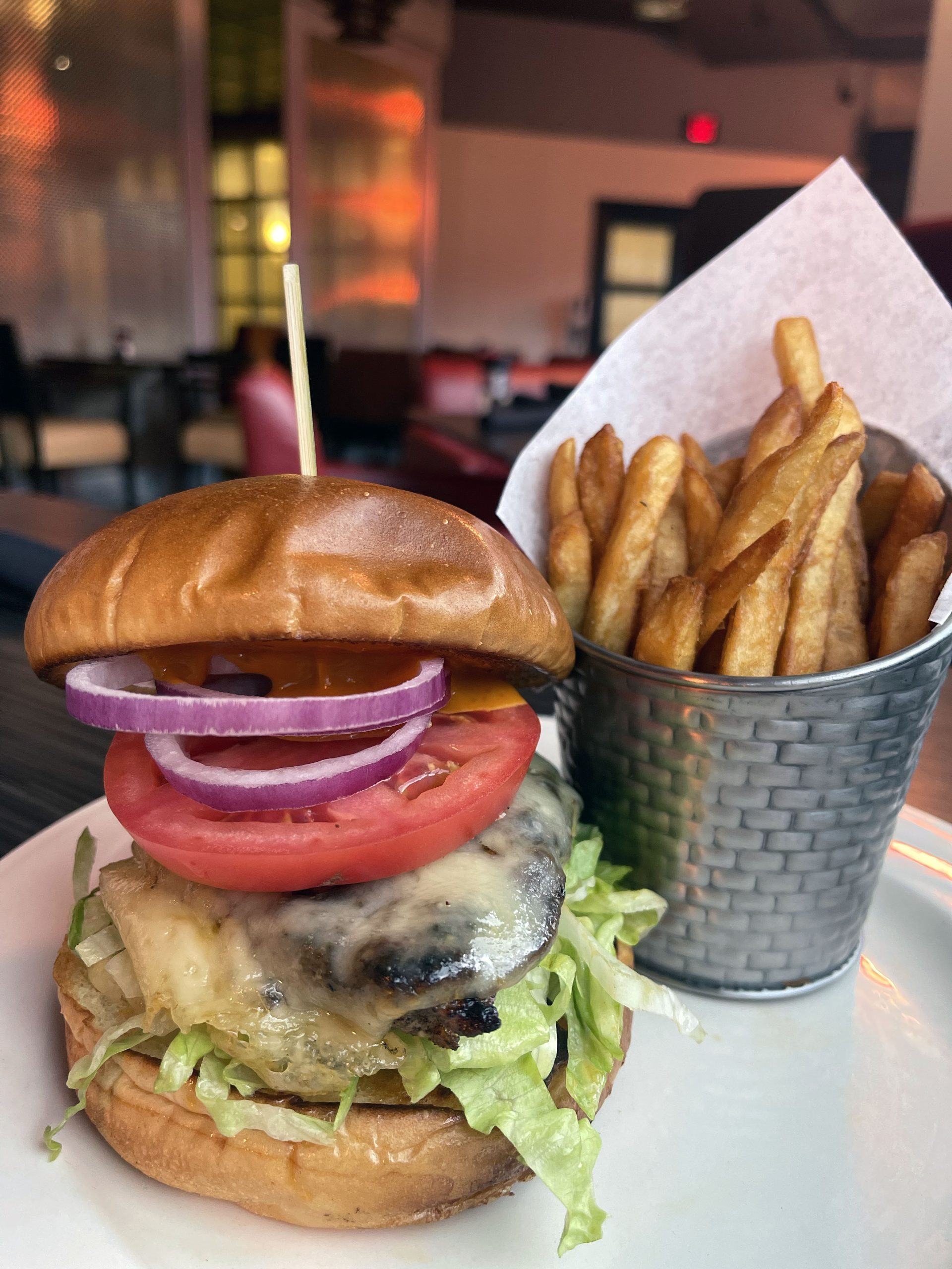 Grilled Chicken Sandwich with french fries on a plate