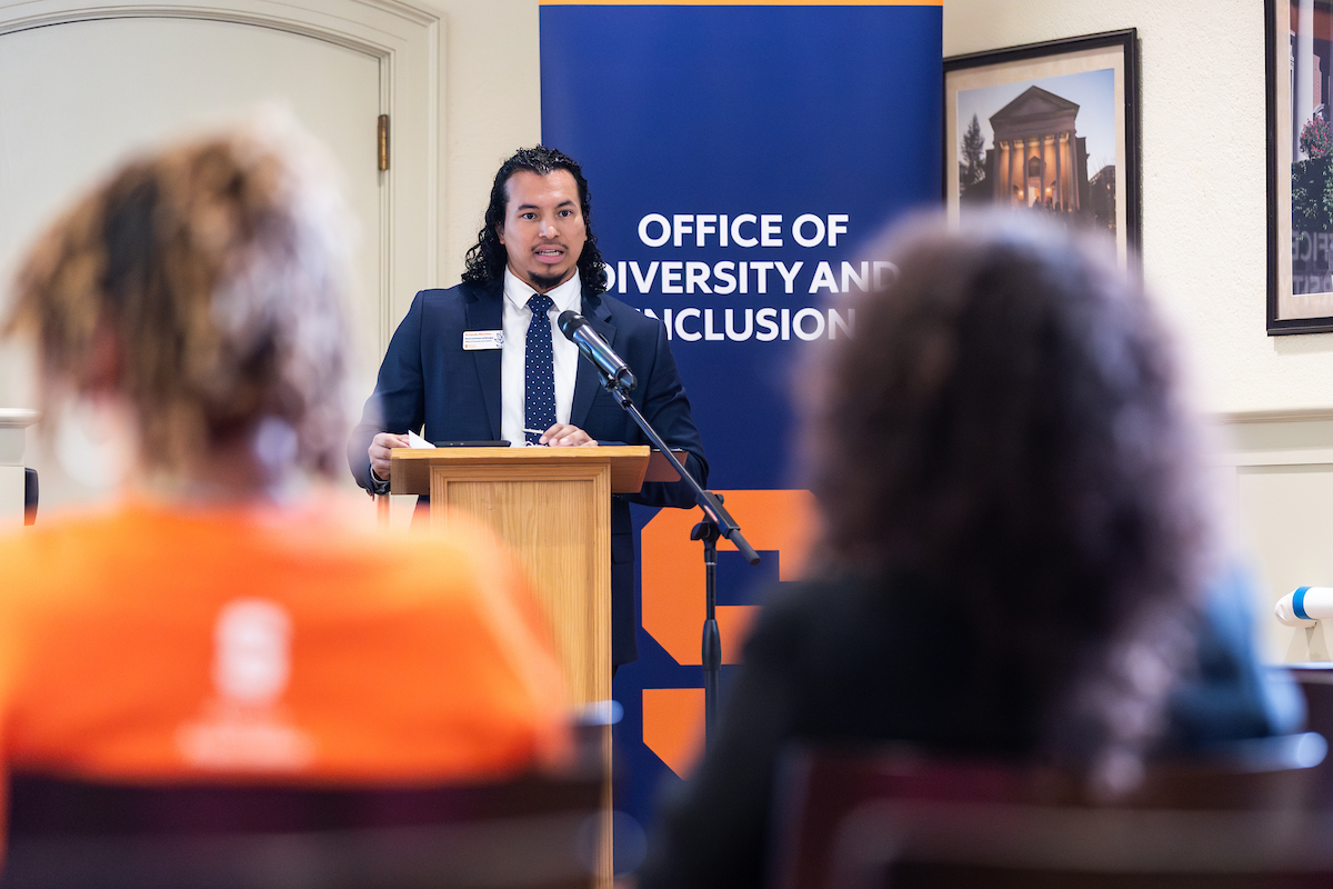 person speaking in front of audience