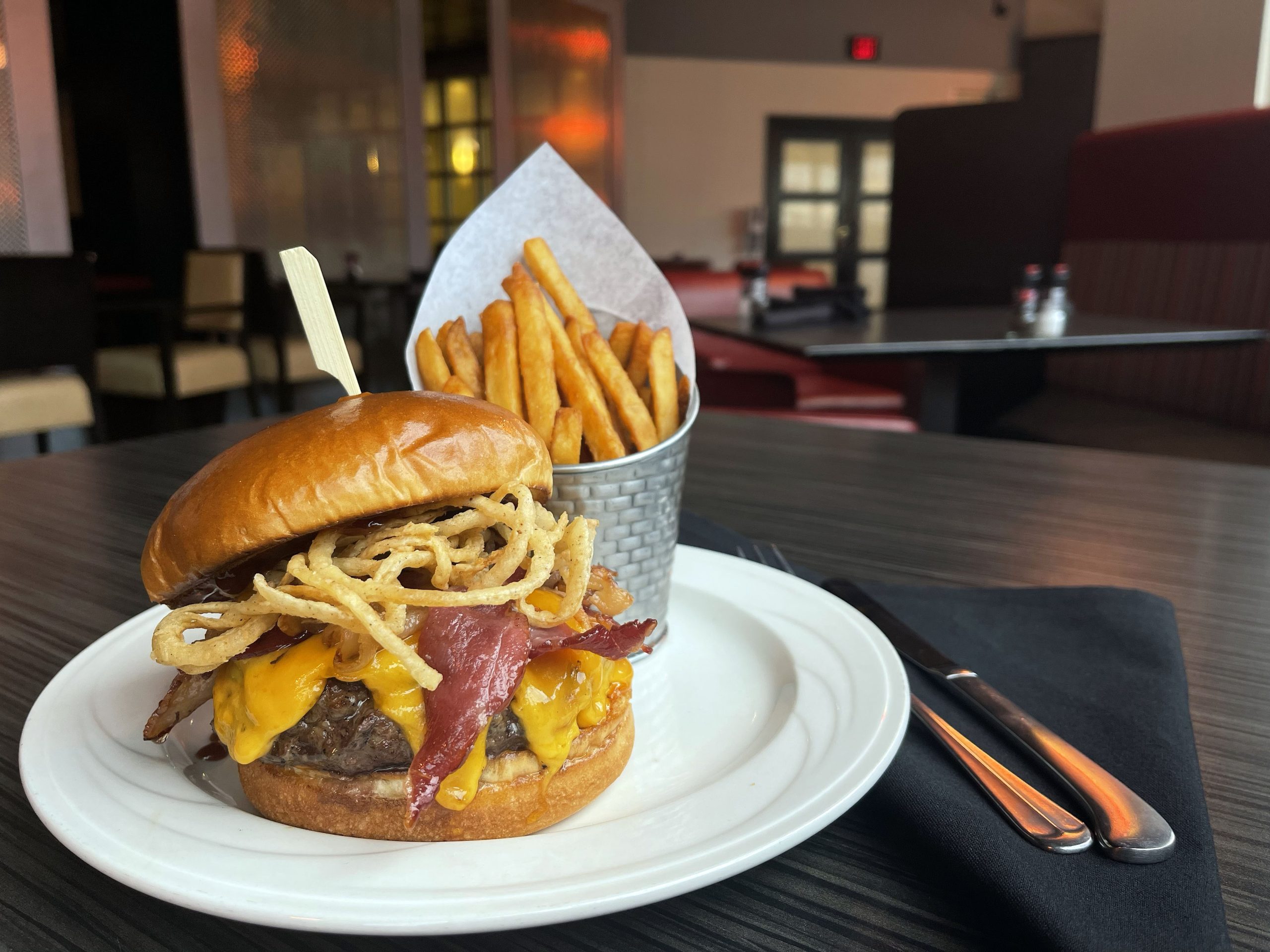 Roadhouse Burger and fries on a table