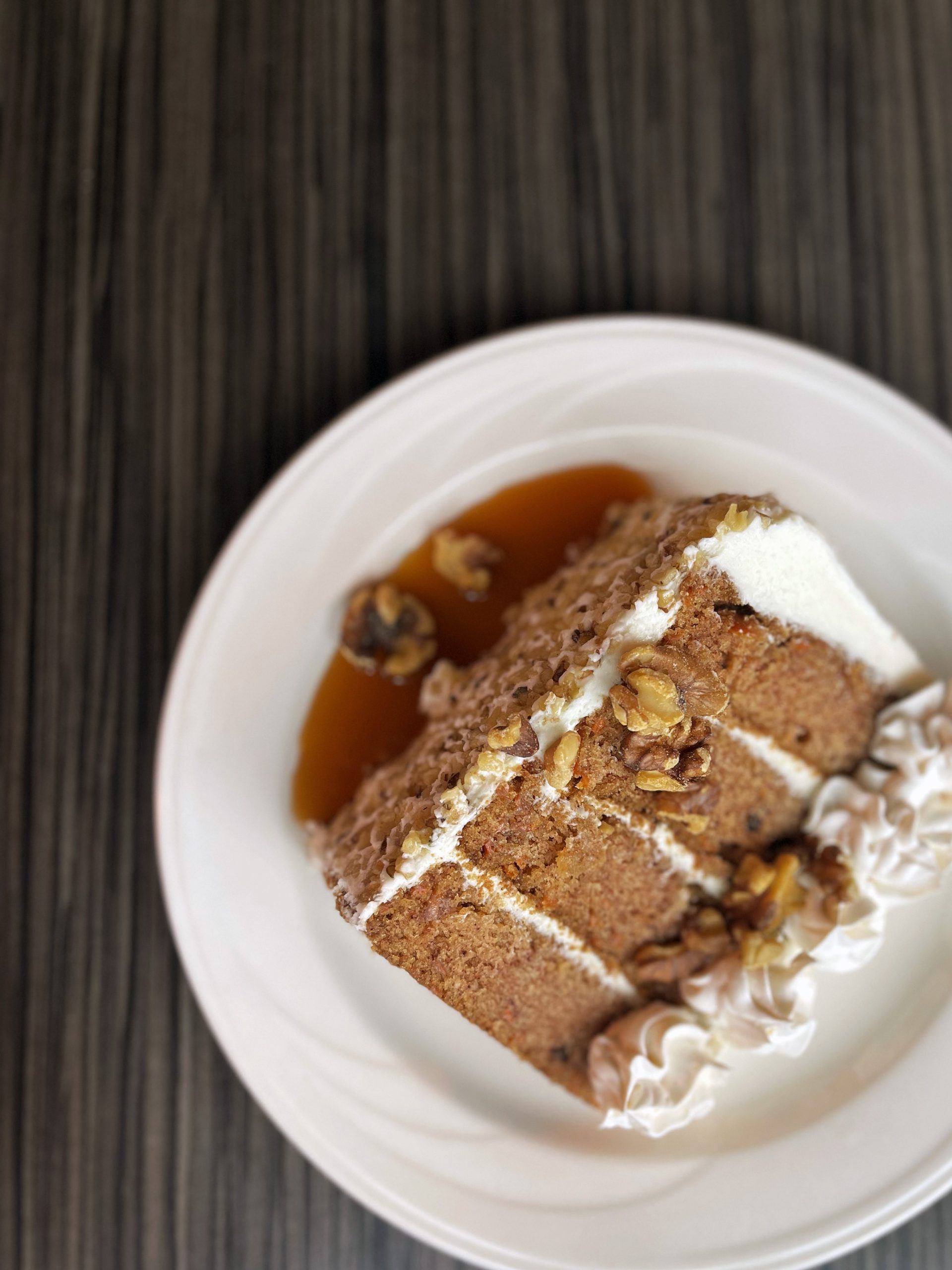 Towering Carrot Cake on a white plate