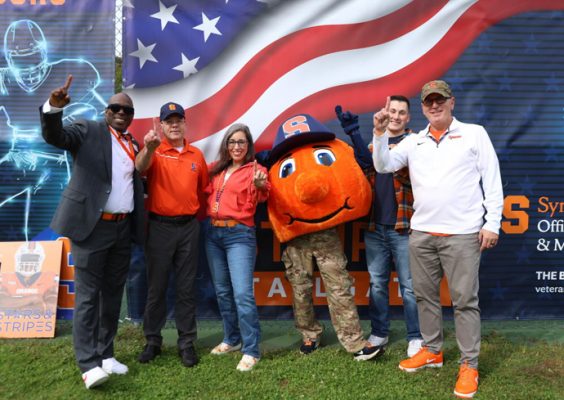 Veterans gather as part of the Stars and Stripes tailgate.