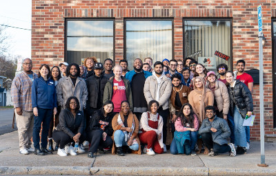 Students in group photo at We Rise Above The Streets