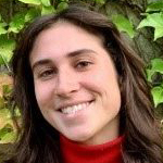 Smiling person looking at camera