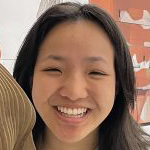 Smiling person facing camera