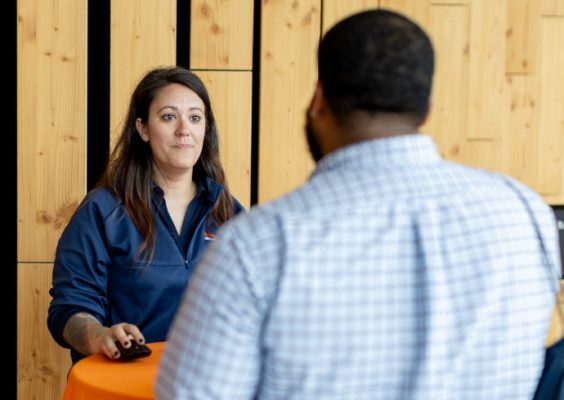 Kari Mickinkle talks with a student veteran