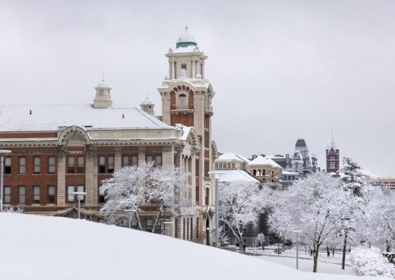 Snow blankets campus on a winter morning.