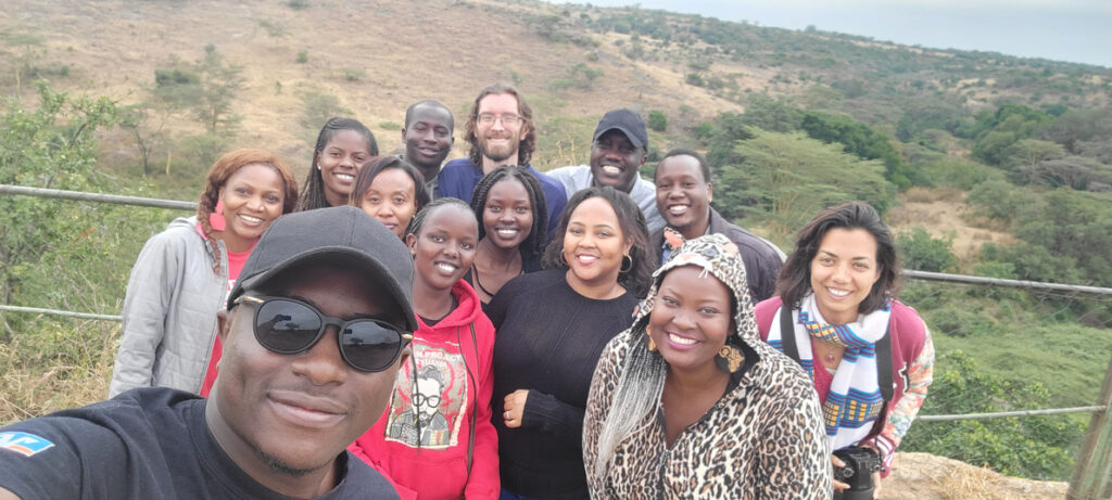 Group of people standing together for a selfie