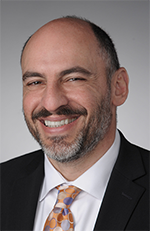 Man smiling for headshot