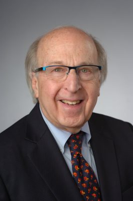 Man smiling for a headshot