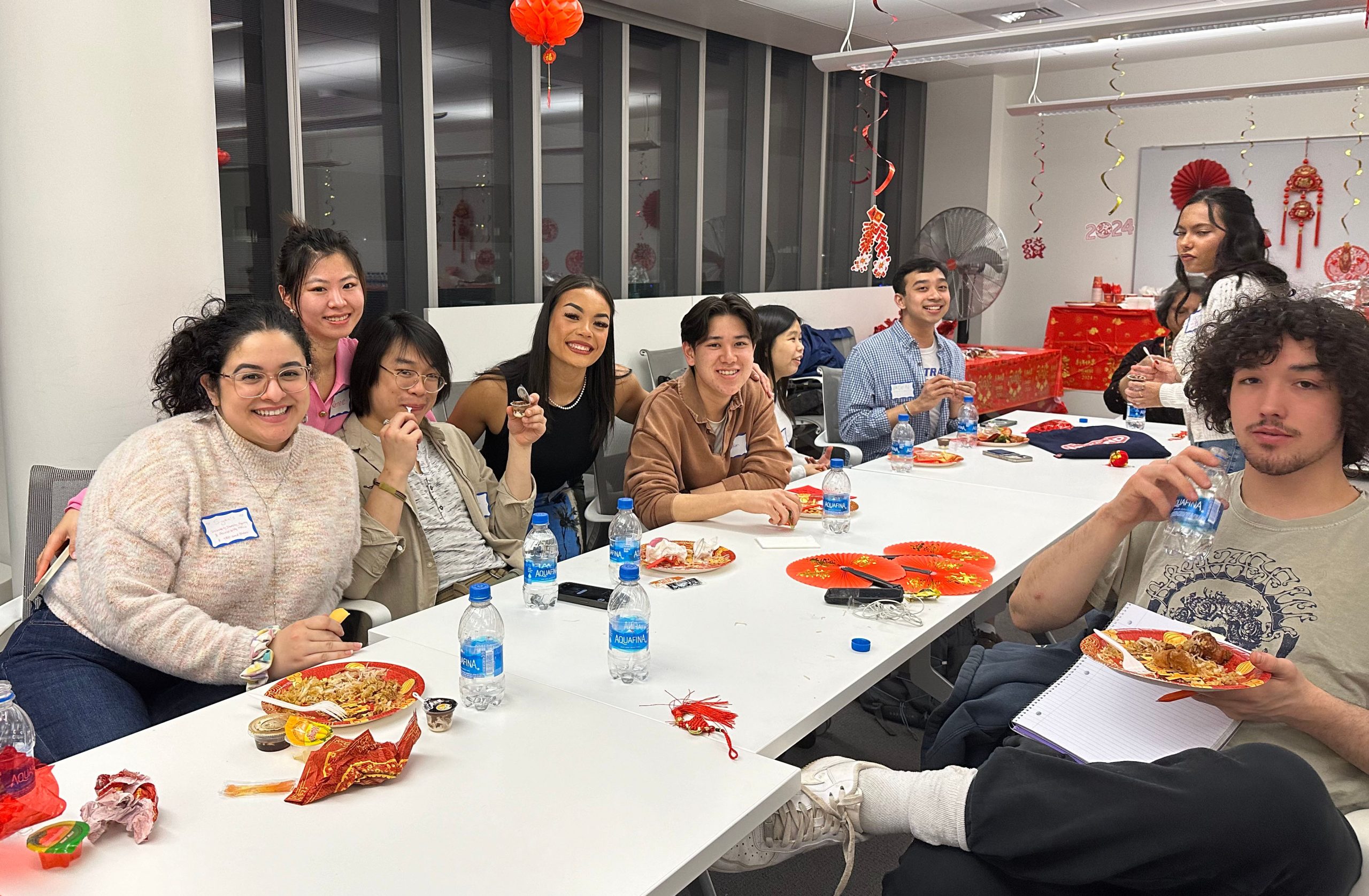 Group of people sitting at a table.