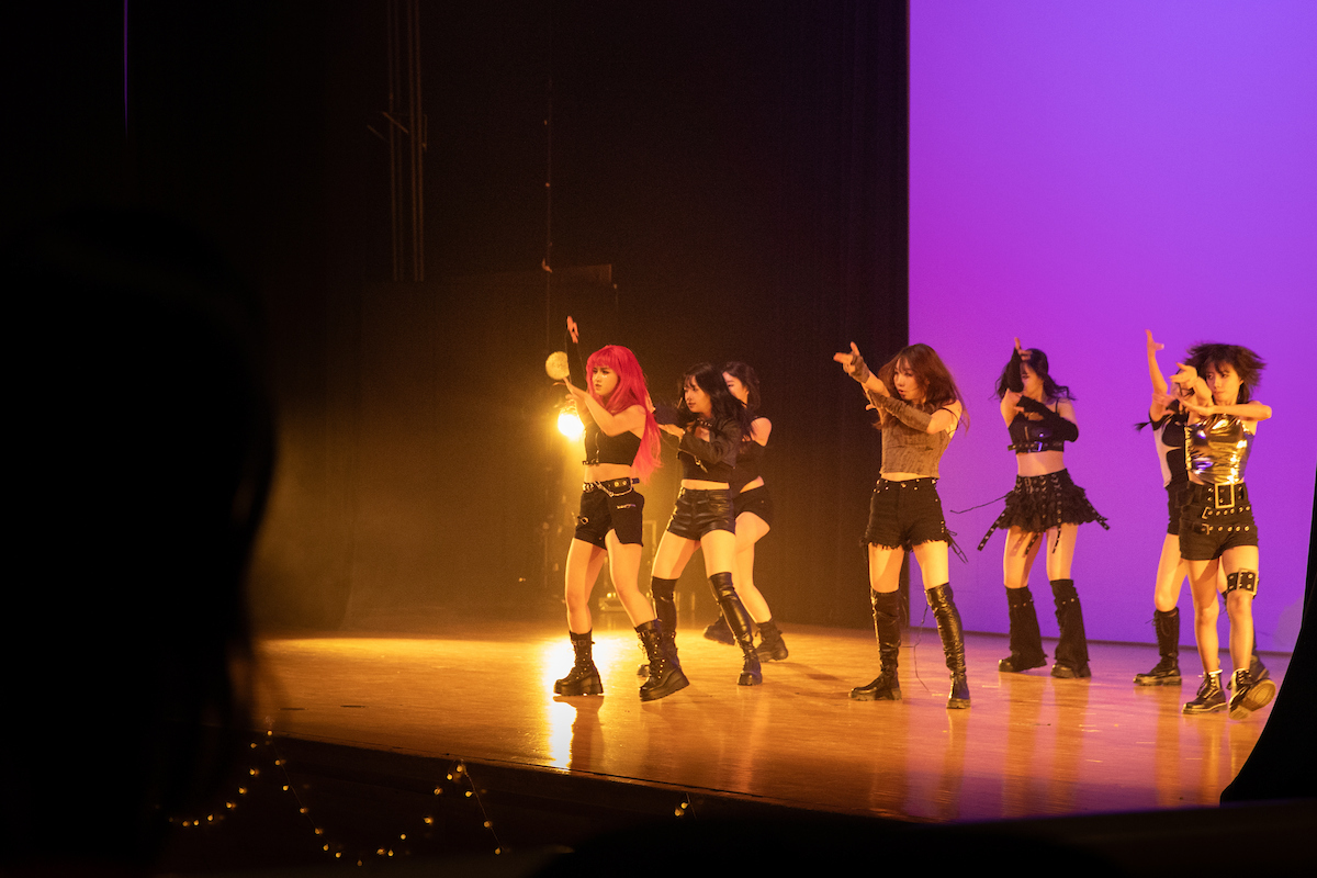 Dancers on stage performing. 