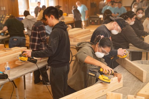 students working on sanding boards