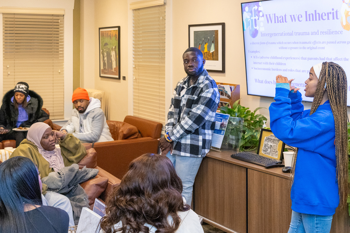 Two students discuss mental health issues with their peers.