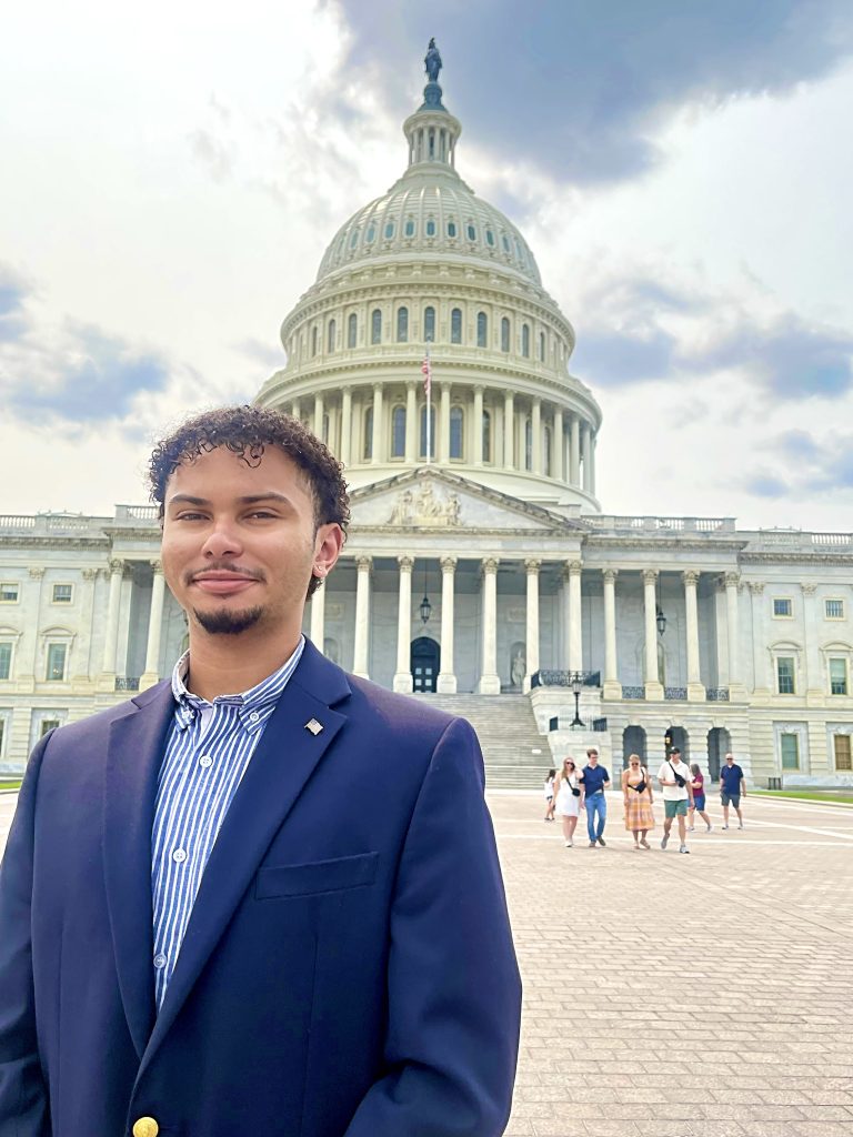 person standing in front of US Capitol building