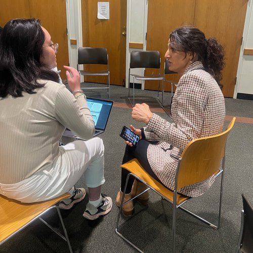 A professor and a student discuss a topic.