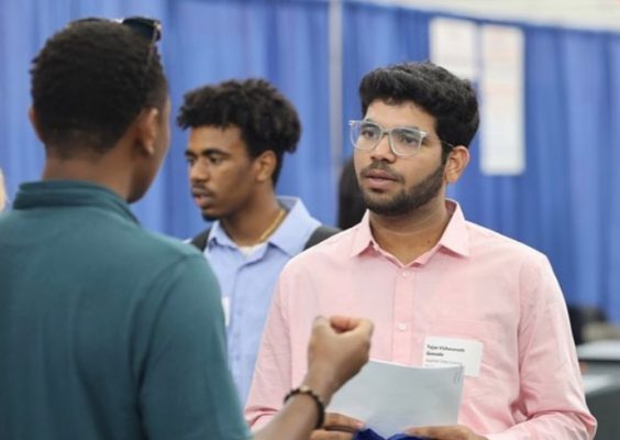 A student meets with a hiring manager.