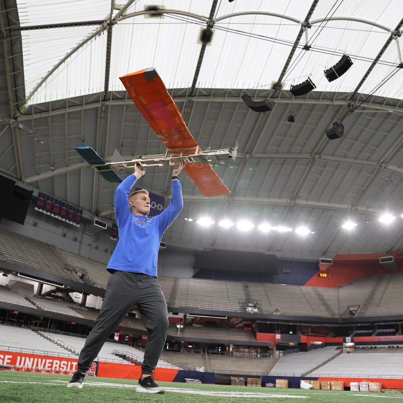 Person flying a plane in the Dome.