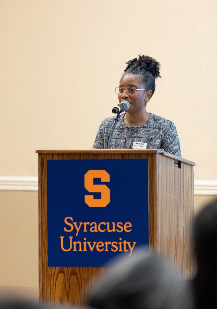 person speaking at podium