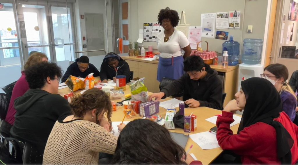 person leading students in a workshop