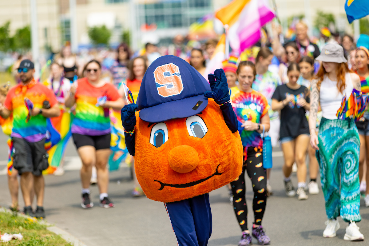 Otto the Orange marching in the CNY Pride Parade. 