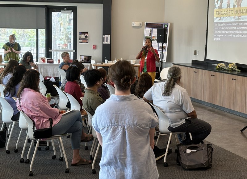 person talking in front of an audience