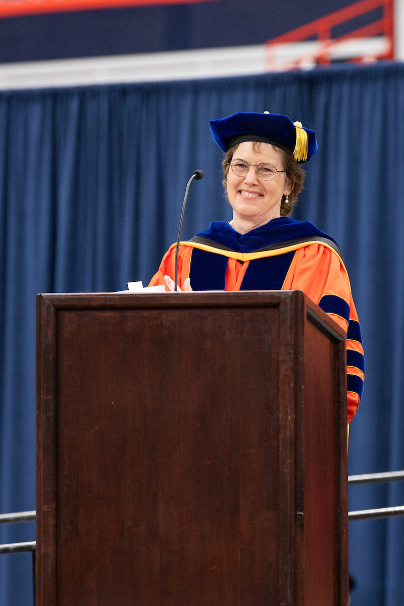Woman standing at a podium