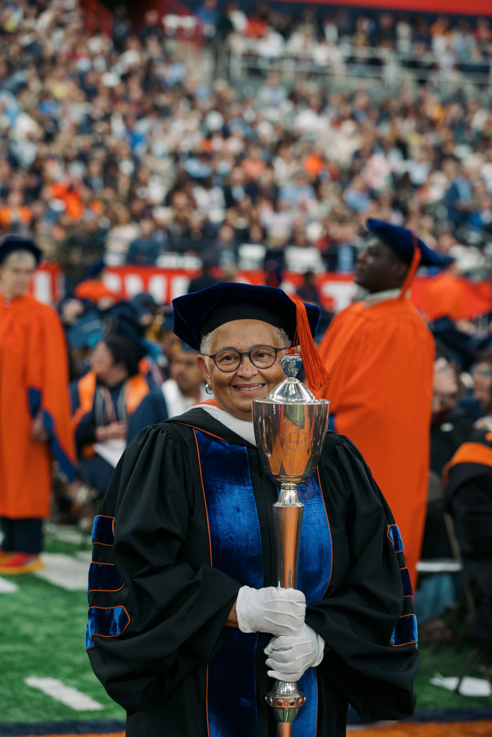 Woman carrying a mace