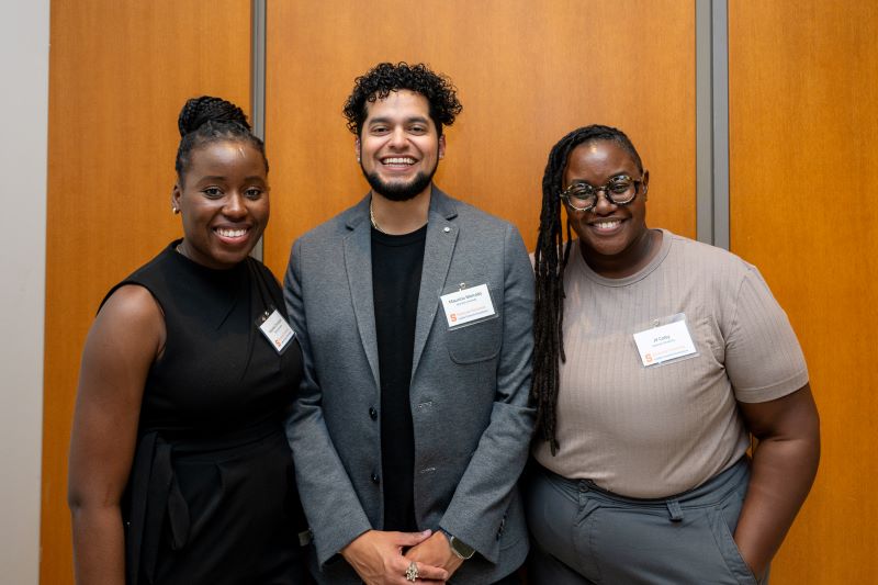 three young people at a reception
