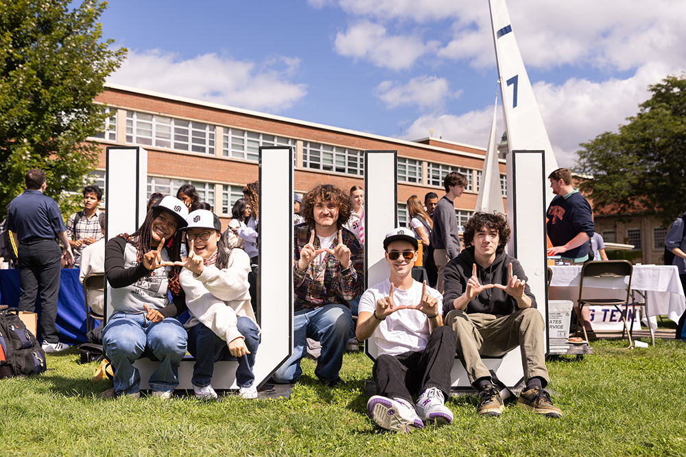 student members of the University Union pose on the Quad during the fall 2023 Involvement Fair