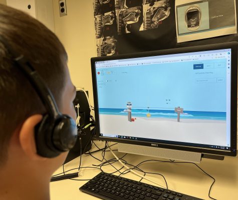 A child uses visual acoustic biofeedback software.