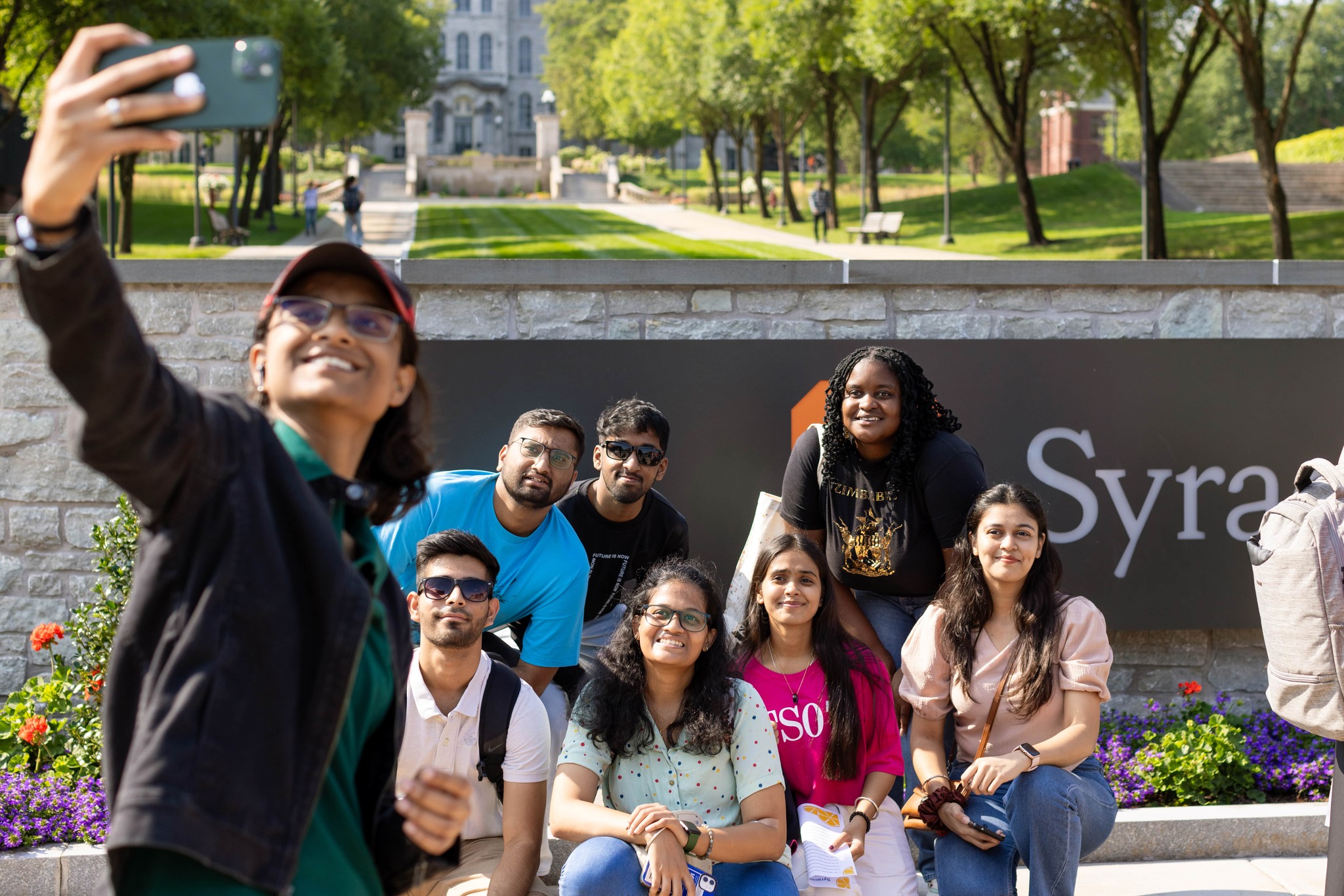 Someone taking a selfie with a large group of people.