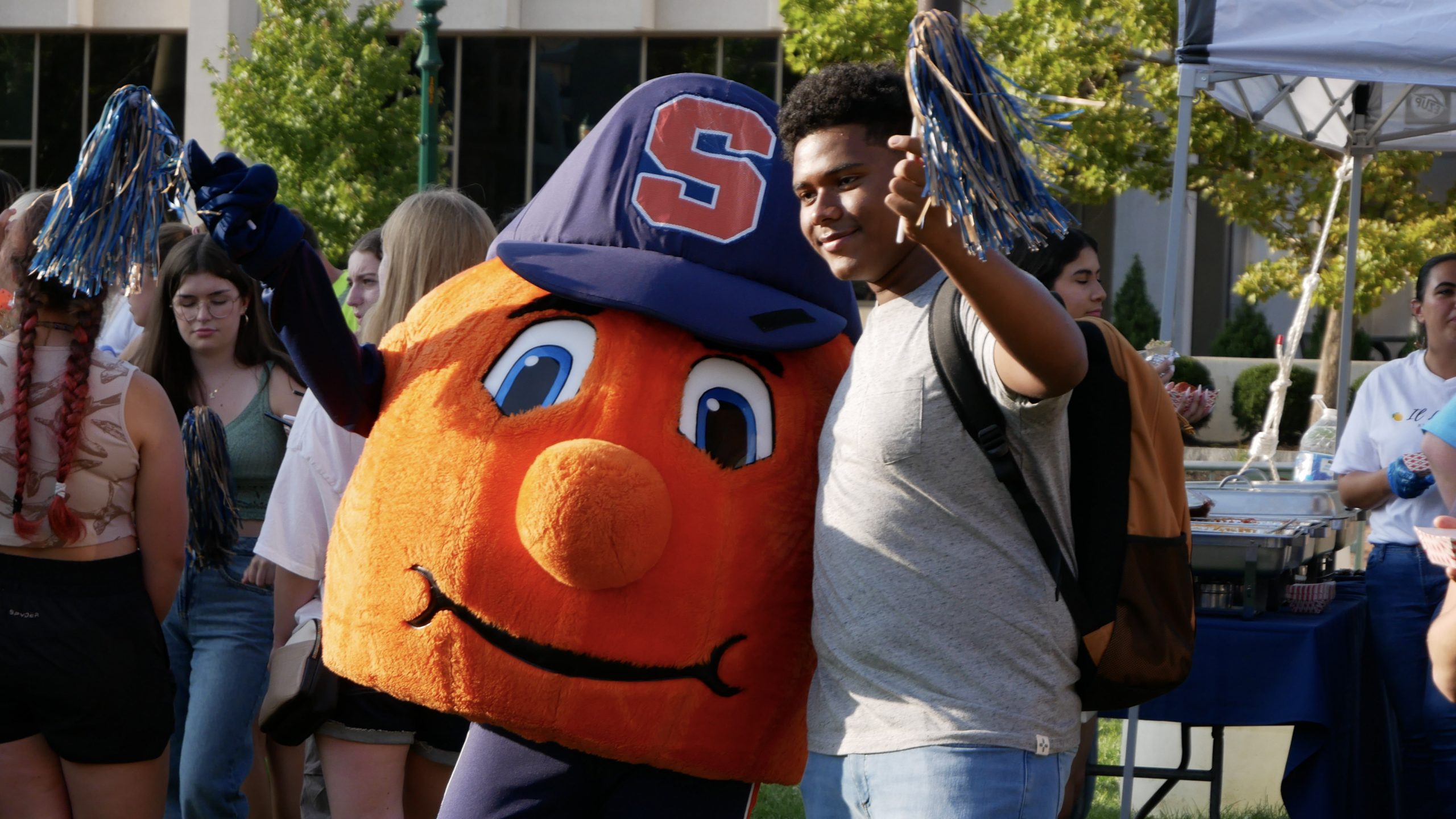 Otto and a student taking a picture together