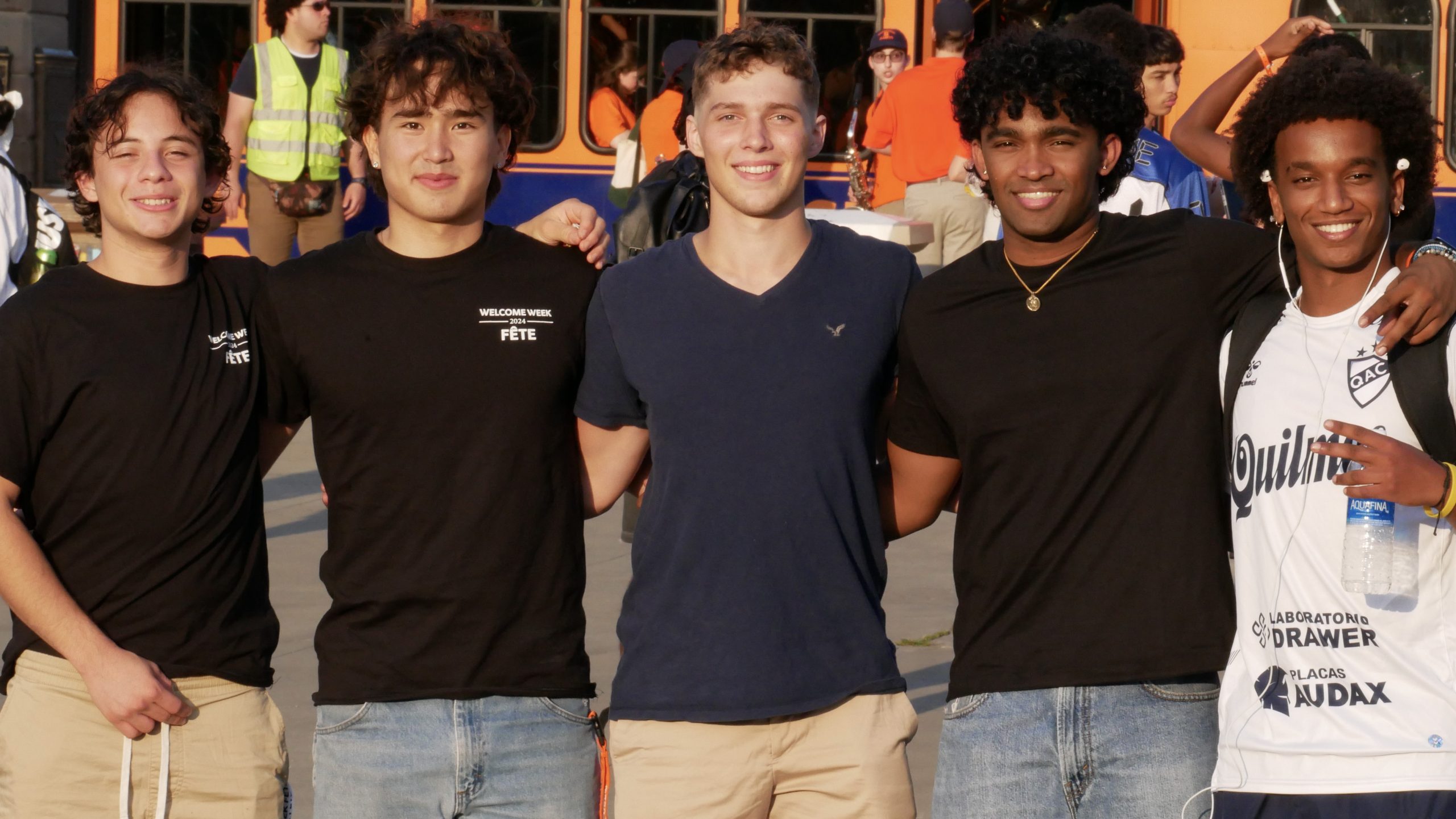 Five students standing together for a photo