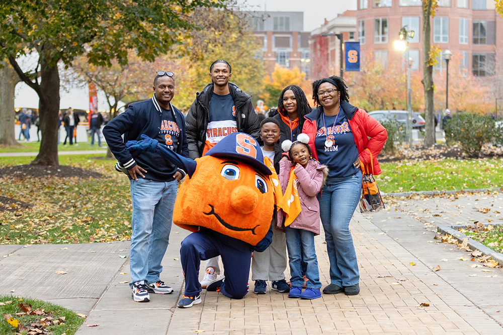 A family celebrating Family Weekend