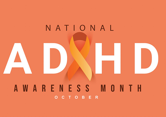 Graphic for National ADHD Awareness Month, featuring the text 'ADHD' in large white letters, entwined with an orange and yellow awareness ribbon, on a coral background with the word 'October' below.