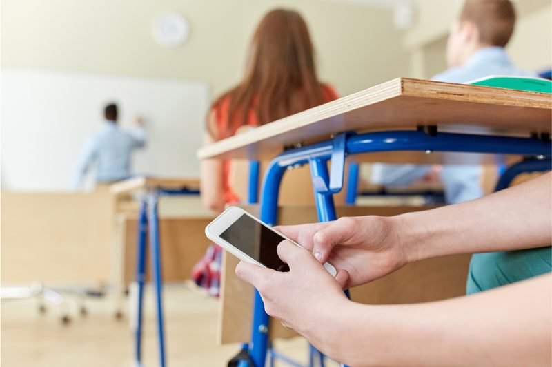 Faculty Experts Debate the Benefits of Banning Cell Phones in Schools