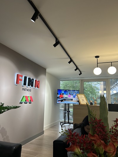 office space with name of company, Finn, on wall