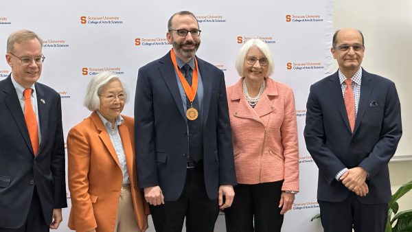 University leaders gather for the installation of Walters Professor Alexander Maloney