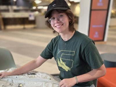 Student’s Mobile Upcycled Clothing Business Turns Trash Into Treasures